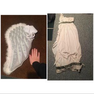 Glittery wings and an Egyptian dress.